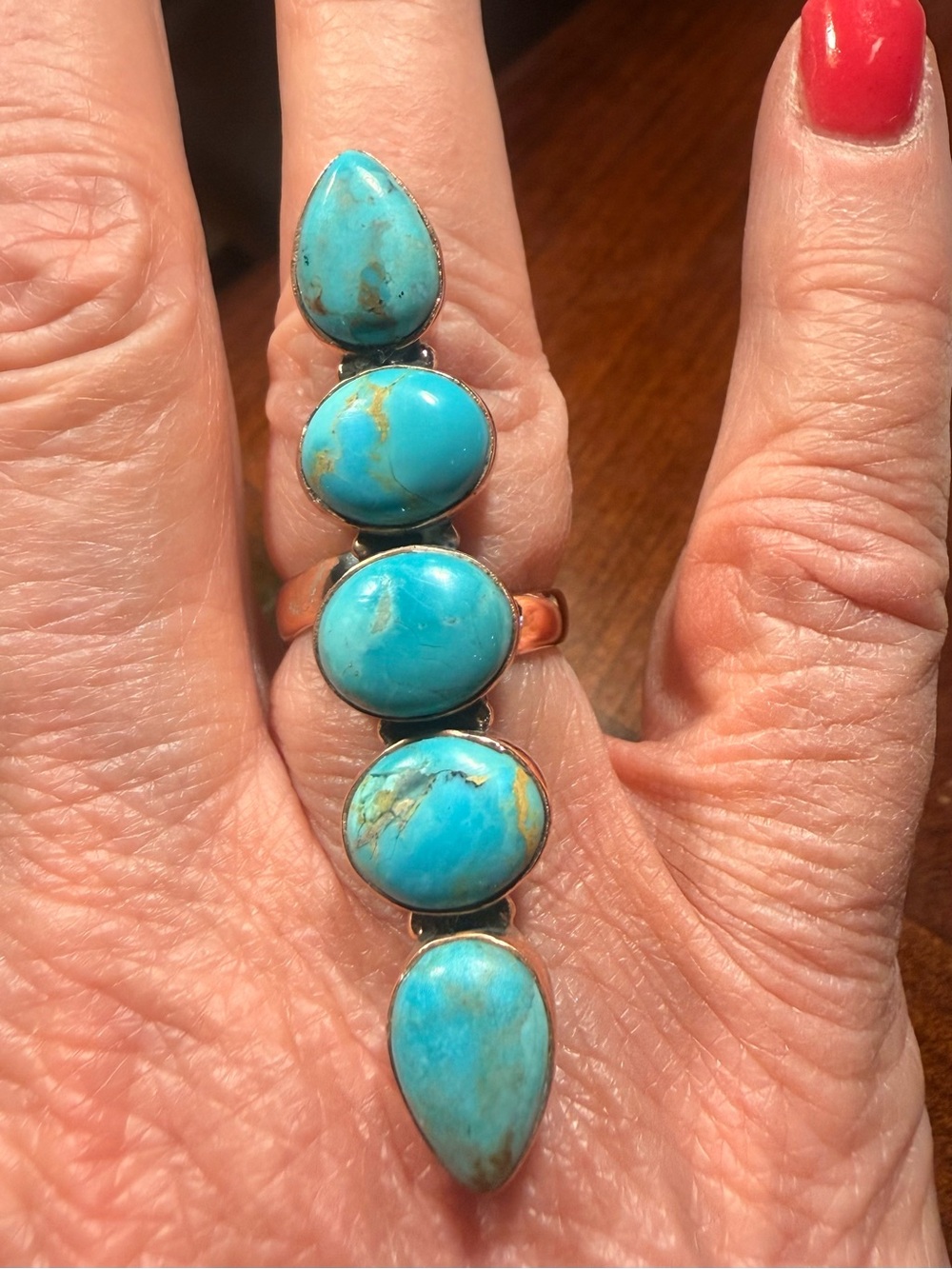Beautiful 5 stone stack of Kingman Turquoise set in Copper
Size 6 adjustable